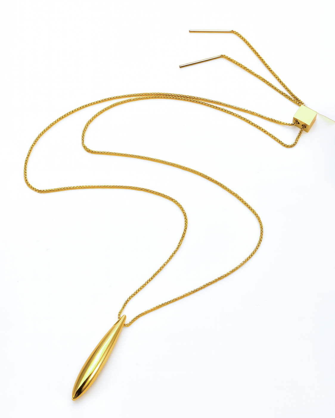 The Droplets Pendant Necklace by For Art's Sake® features a sleek, gold-toned teardrop pendant on an adjustable delicate chain, shown against a white background—an elegant piece of contemporary jewelry.