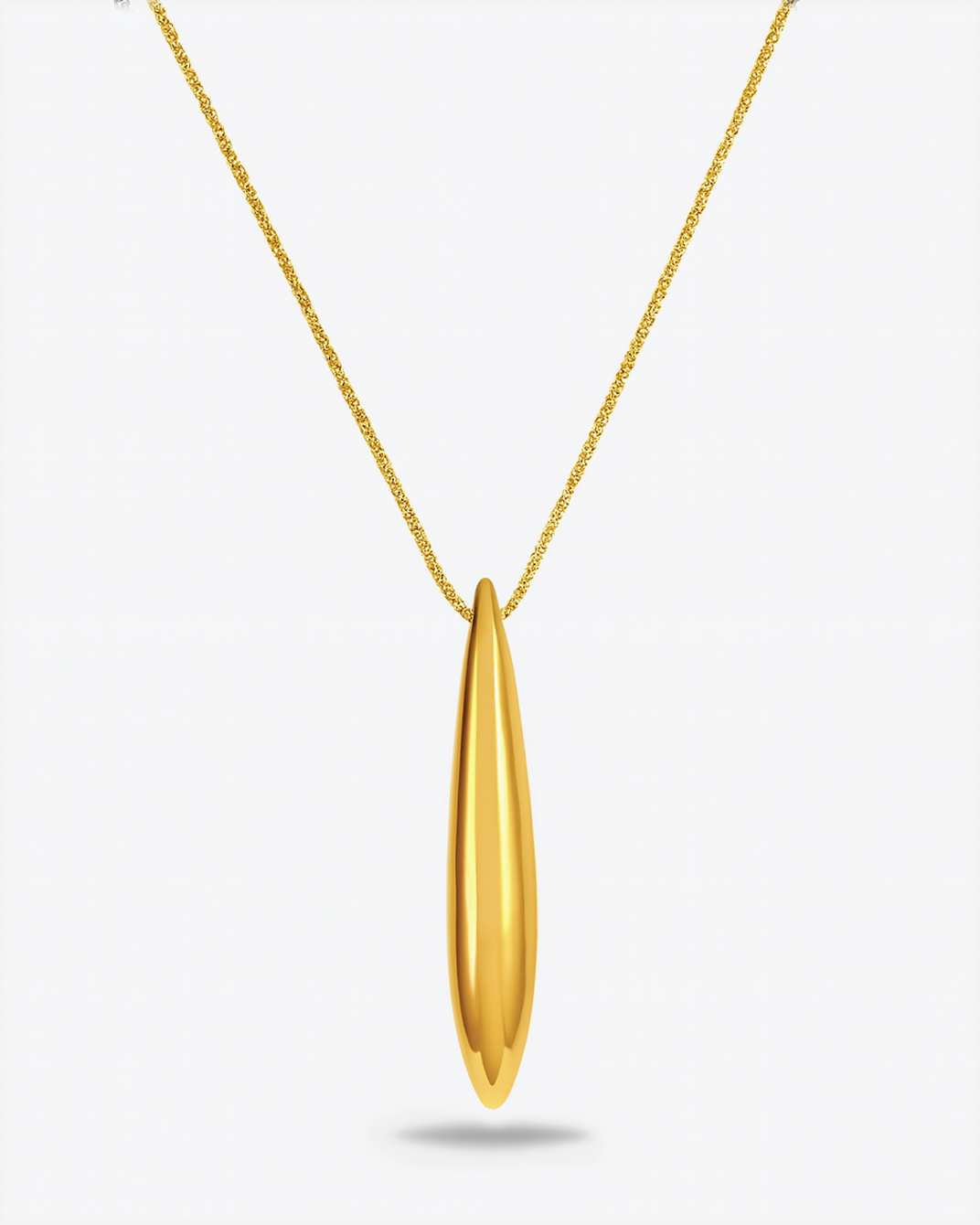 The Droplets Pendant Necklace by For Art's Sake® features a delicate gold chain with a smooth, elongated metal droplet pendant, shown on a plain white background.