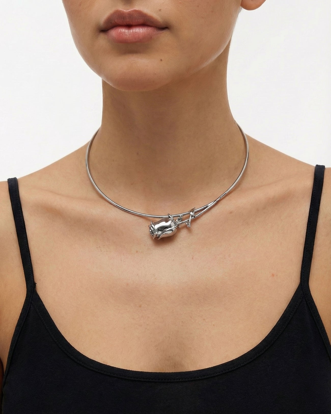 A model wears The Rose Choker by For Art's Sake® with a black spaghetti strap top, set against a plain white background.