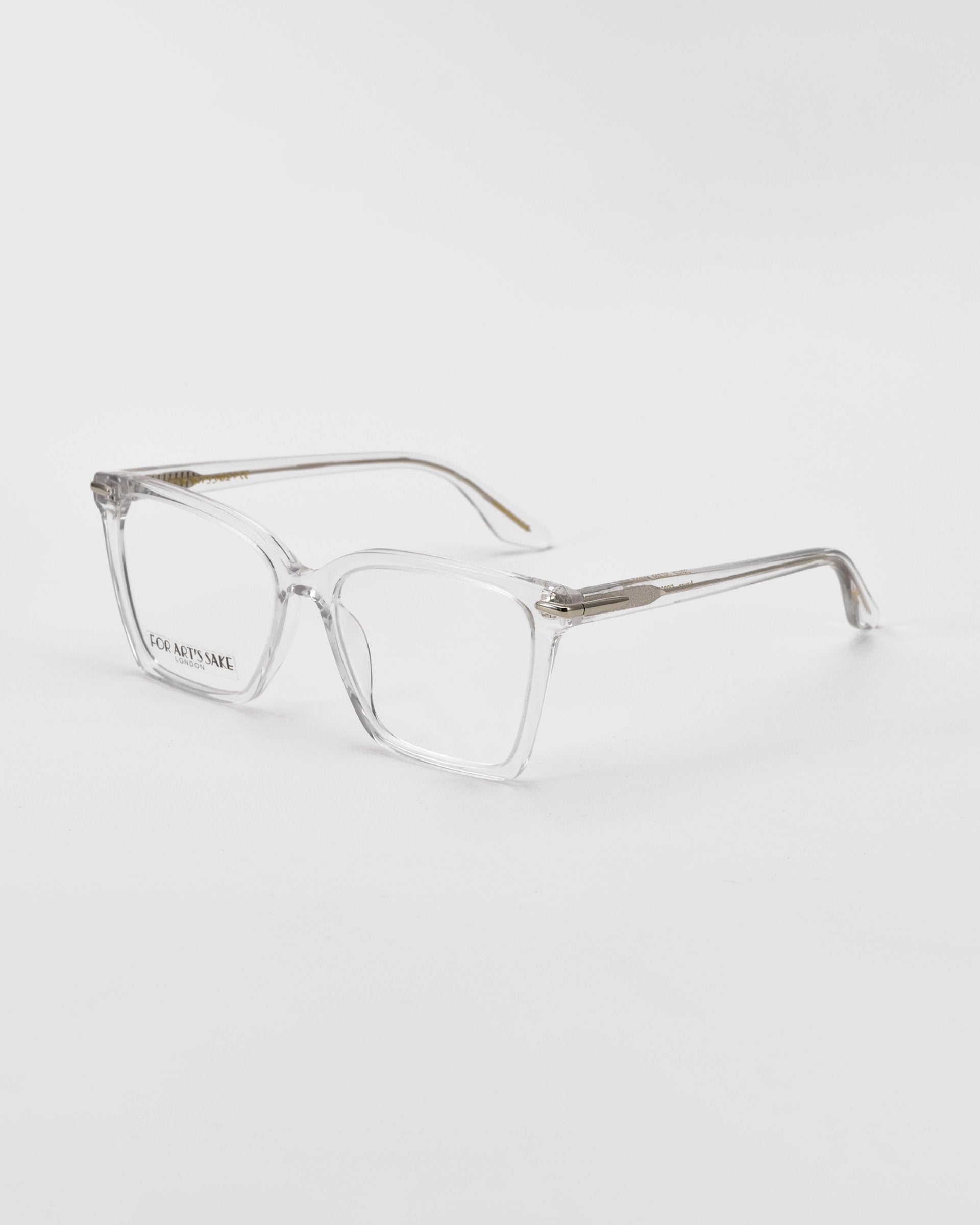 Clear rectangular optical glasses facing sideways on a white background. 