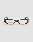 For Art's Sake® Cigar cat-eye optical frames feature tortoiseshell acetate, vintage thick oval lenses, and gold-accented temple arms, shown against a plain white background.