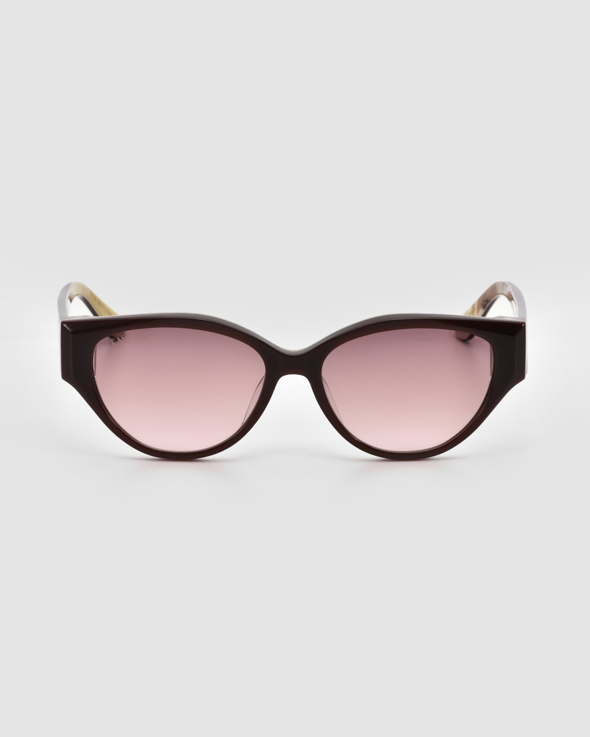 Front view of For Art's Sake® Vincent Van Gogh sunglasses: black cat-eye frames with pink-tinted lenses, shown against a plain light gray background.