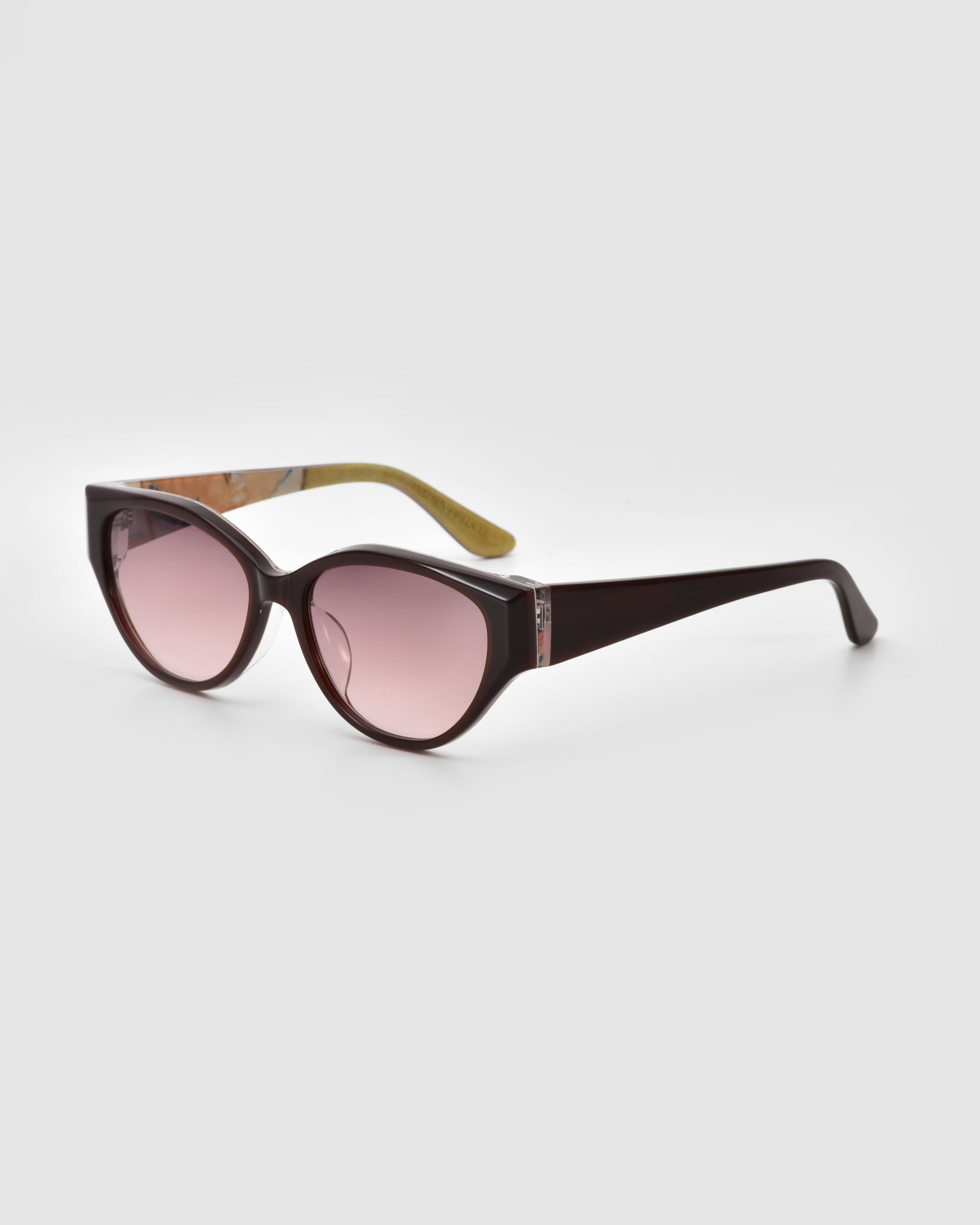 For Art's Sake® Vincent Van Gogh sunglasses feature bold purple cat-eye frames, round pink-tinted lenses, and wide arms—an eye-catching collectible, displayed against a light gray background.