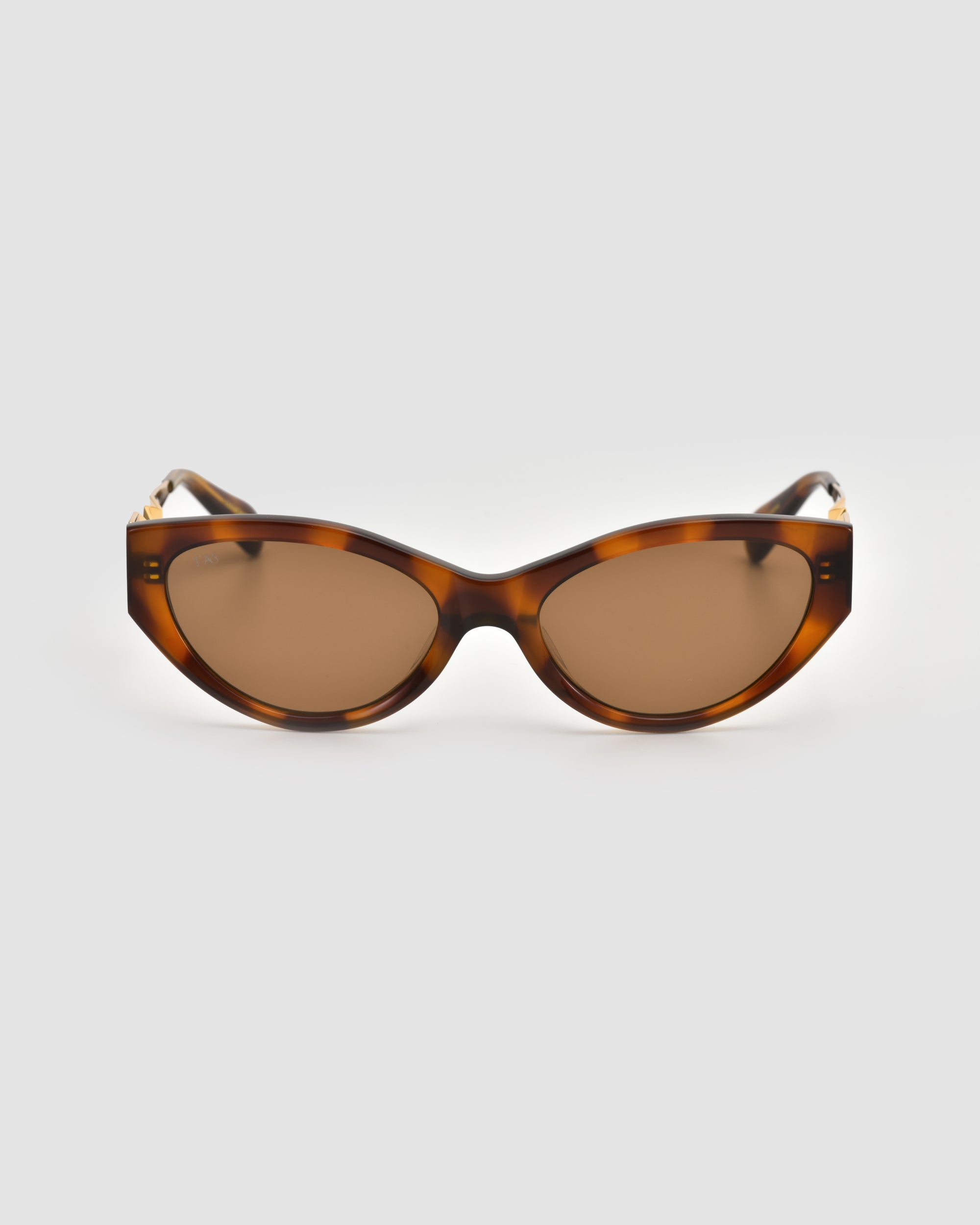For Art's Sake® Unfold tortoiseshell geometric cat-eye sunglasses with brown tinted lenses, shown against a plain light gray background.