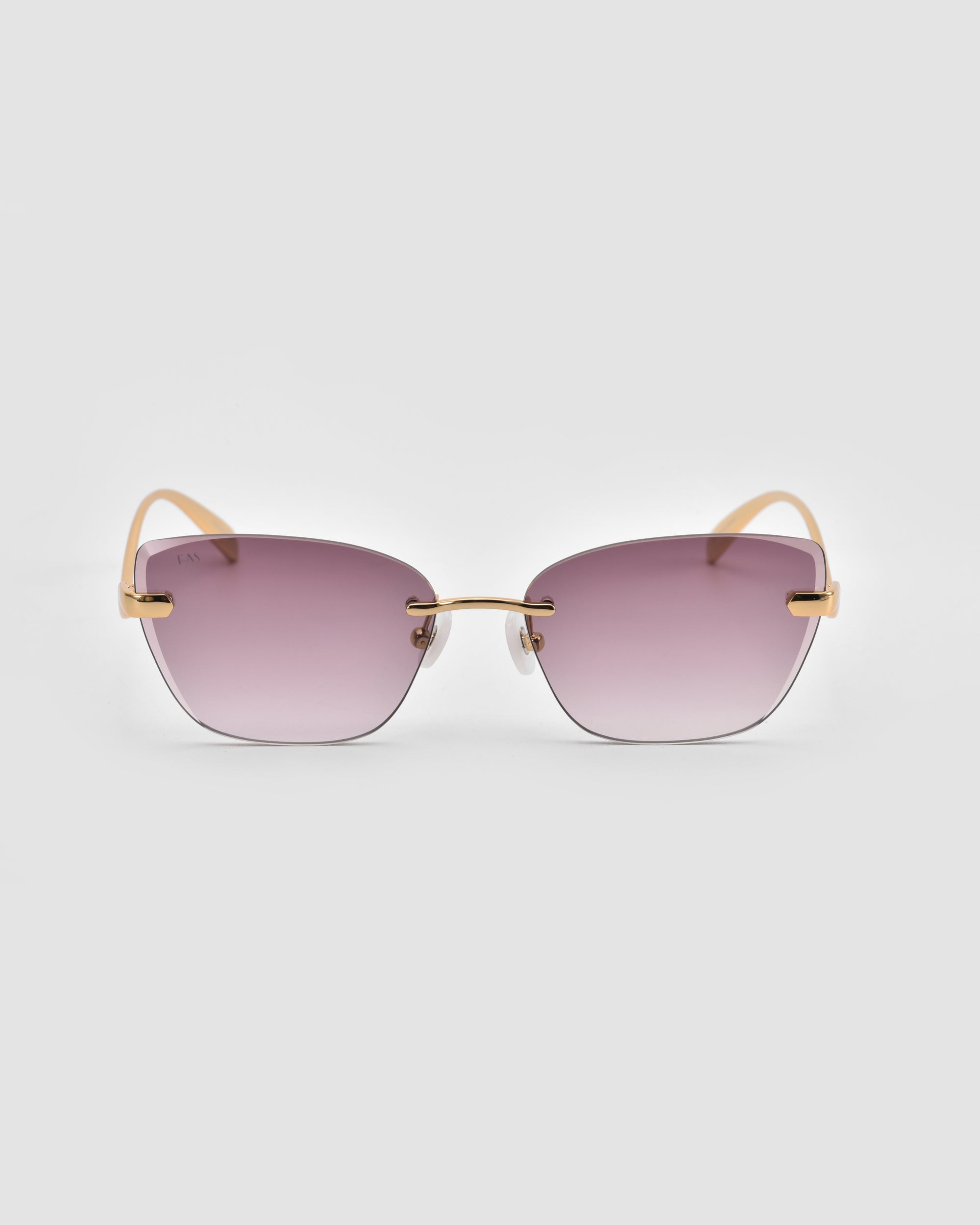 The For Art's Sake® Spark sunglasses feature a rimless cat-eye design, purple gradient lenses, a gold metal bridge, and sculptural 3D curve arms, shown facing forward on a light gray background.