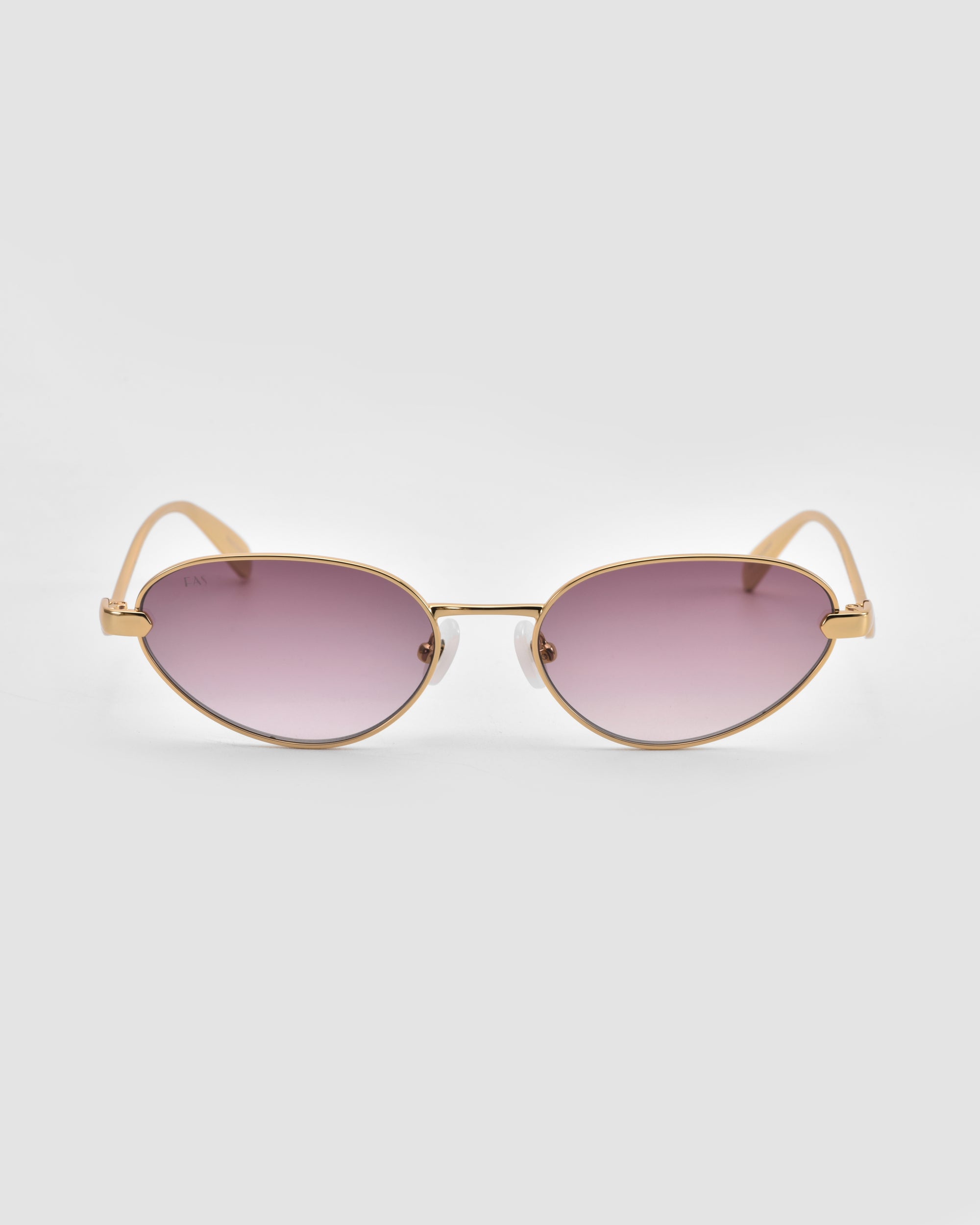 The Rebirth sunglasses by For Art's Sake® feature gold frames, oval gradient purple lenses, and a sculptural 3D design, shown facing forward against a plain light gray background.