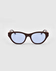 The Cuts cat-eye sunglasses by For Art's Sake® feature blue lenses.