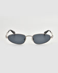 Droplets by For Art's Sake® are retro oval sunglasses with silver metal frames and dark lenses, shown facing forward on a plain white background.