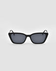 For Art's Sake® Harmony(S) black cat-eye sunglasses feature dark tinted lenses and a sculptural frame, displayed facing forward against a plain light gray background to showcase the full frame and both arms.
