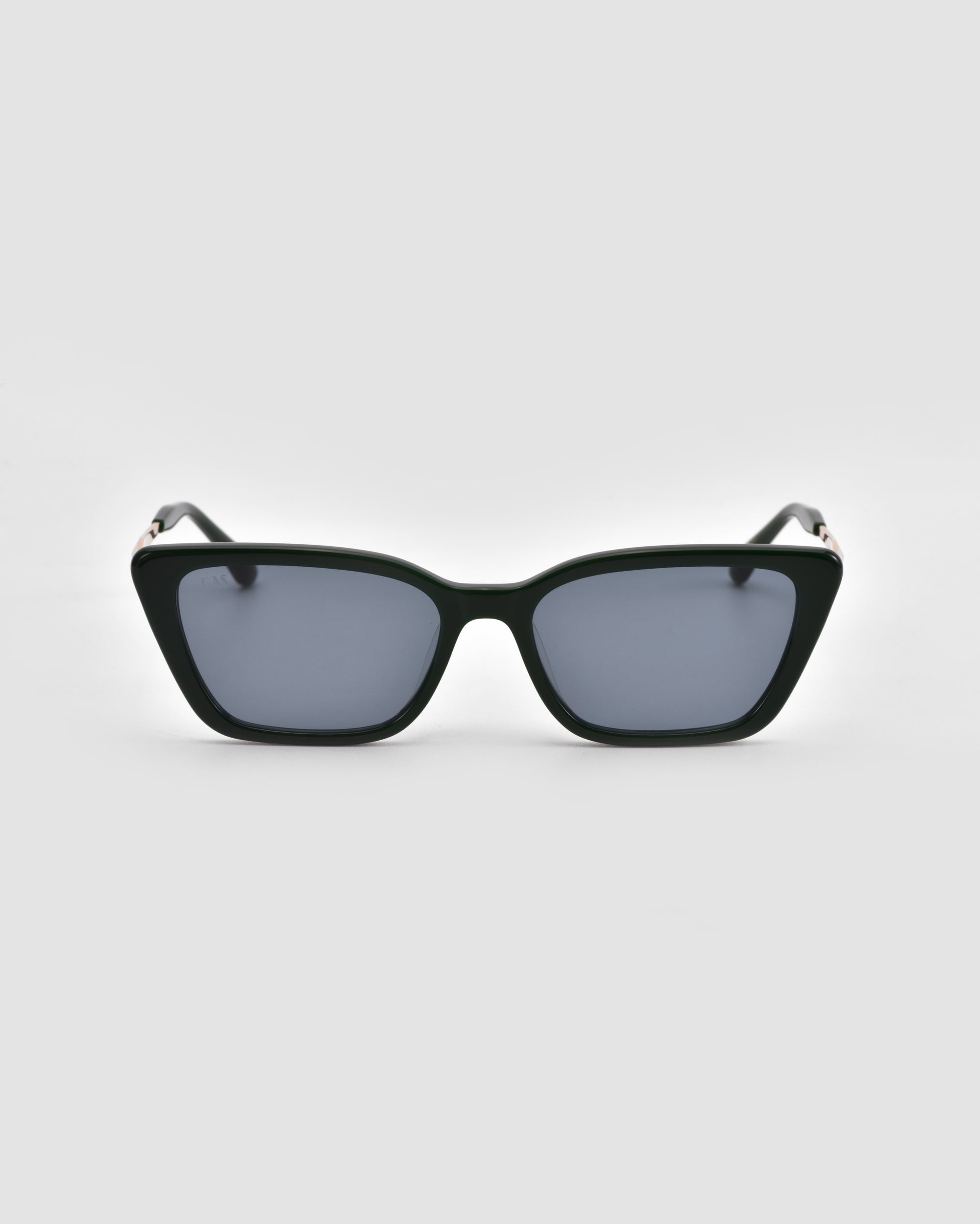 The Harmony(S) by For Art's Sake® are black, square minimal sunglasses with dark tinted lenses and a sculptural frame, shown on a plain light gray background.