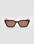 For Art's Sake® Harmony(S) rectangular brown sunglasses feature a sculptural frame with thick, dark edges and brown-tinted lenses, shown against a plain light gray background.
