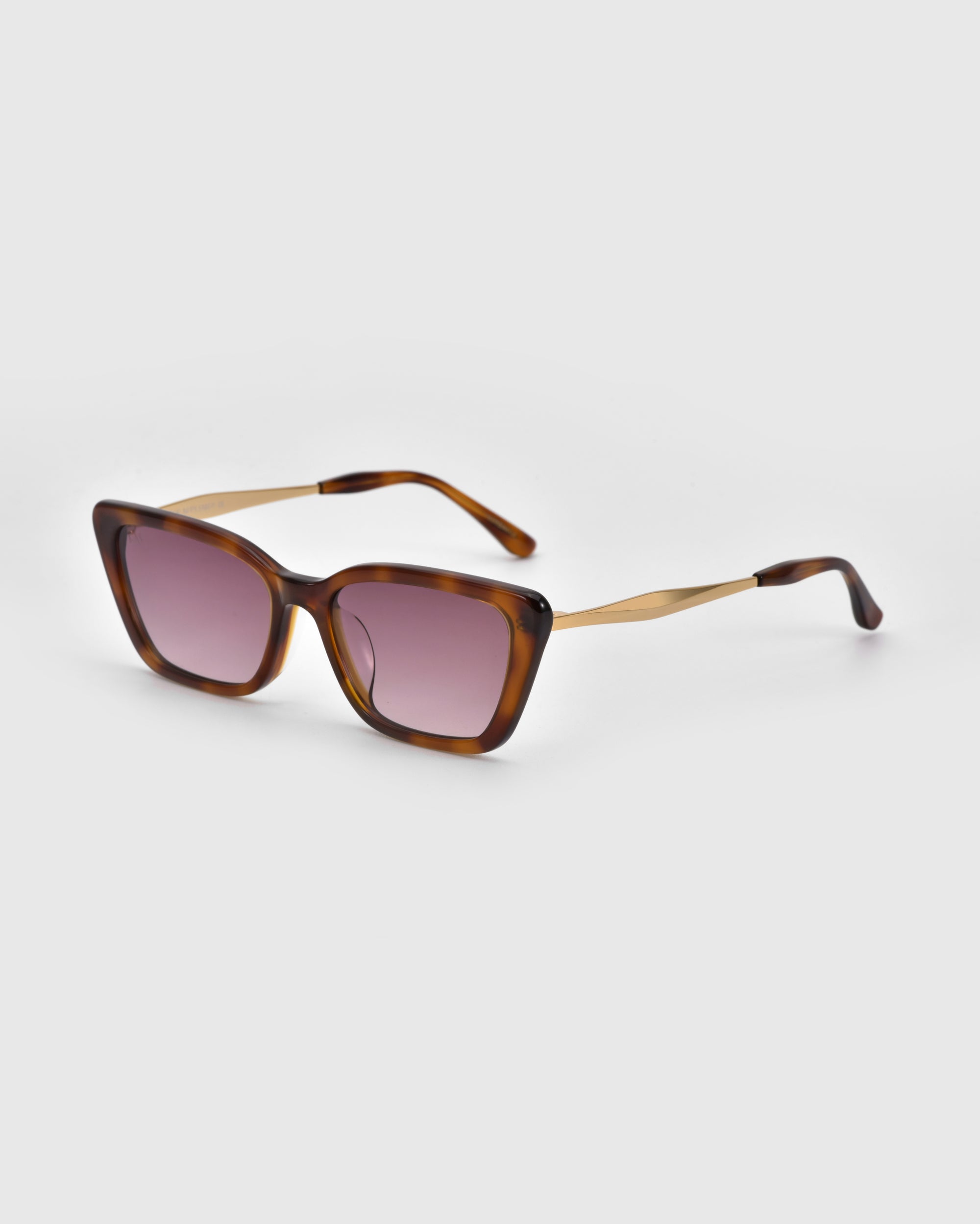 For Art's Sake® Harmony(S) sunglasses in brown tortoiseshell, featuring a boxy frame and gradient pink lenses, are displayed on a white background at an angle to showcase the front and side arms.