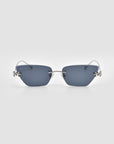 Florist by For Art's Sake®: frameless rectangular sunglasses with dark blue lenses, silver metal arms, and sculpted silver fleur-de-lis accents at each hinge, shown on a plain light gray background.