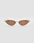 A pair of For Art’s Sake® Lake cat-eye sunglasses with sculpted temples and slim gold frames, photographed against a plain light gray background.