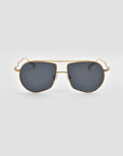 The For Art's Sake® Lines sunglasses feature gold oversized aviator frames, dark tinted lenses, and sculpted temples, displayed facing forward against a plain light gray background.