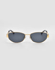 The Abstraction II sunglasses by For Art's Sake® feature a bold gold metal frame, dark rectangular lenses, and black sculptural temple arms, shown against a plain light grey background.