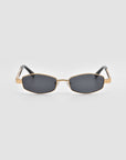 The For Art's Sake® Mesa I sunglasses feature sculptural gold frames, rectangular black lenses, and black arms, elegantly displayed on a plain light gray background.