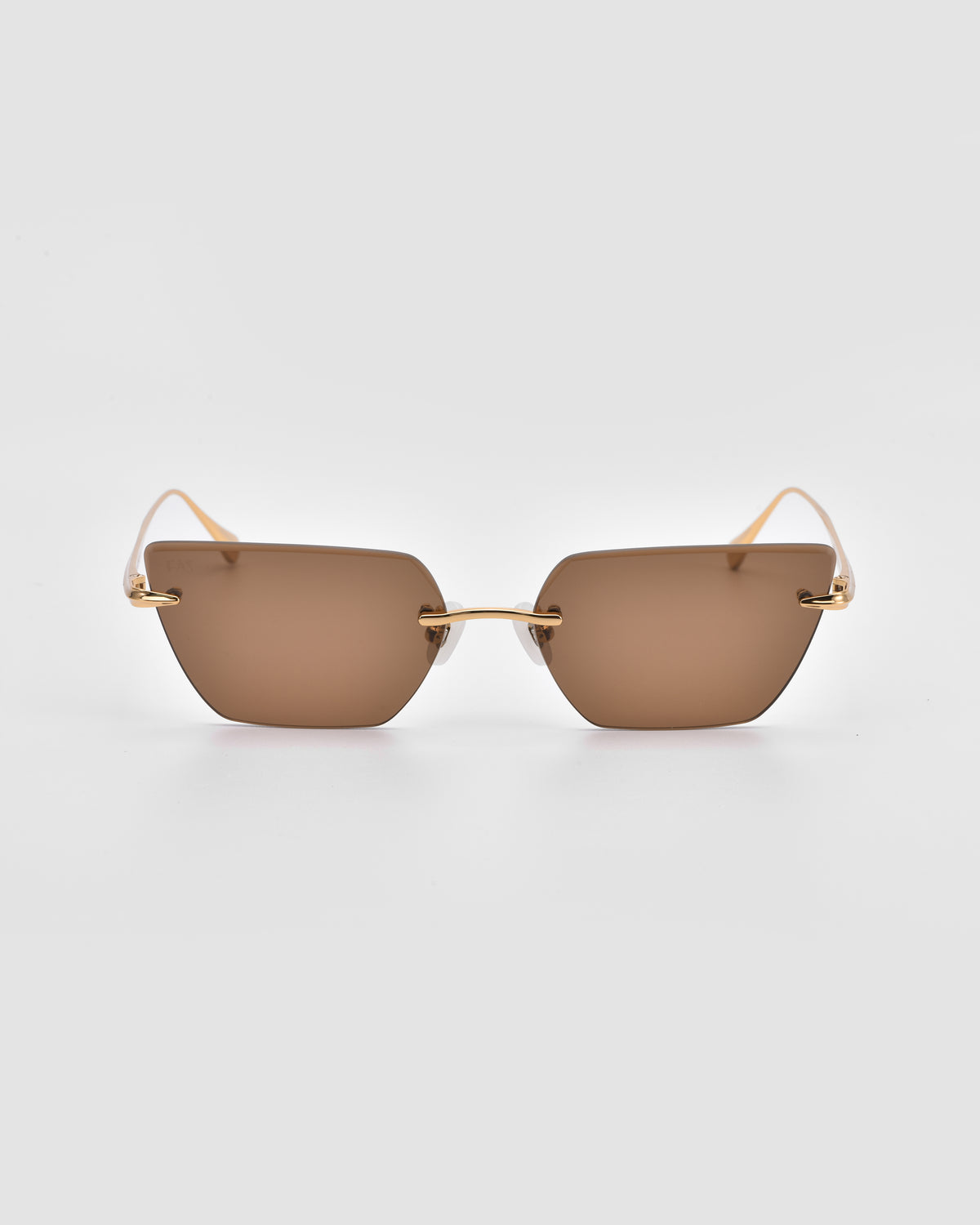 For Art’s Sake® Sienna II rimless sunglasses with rectangular lenses, slim gold arms, and jade stone nose pads are shown front-facing on a plain light gray background.