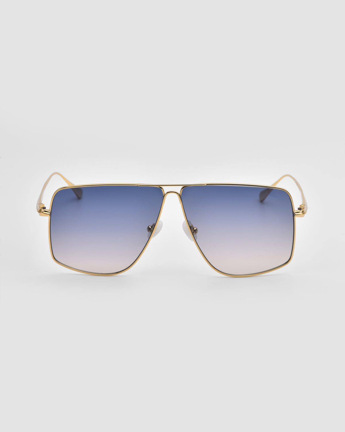 For Art’s Sake® Marisol II gold-framed oversized aviator sunglasses with sculpted metal accents and gradient blue lenses, shown from the front against a plain white background.