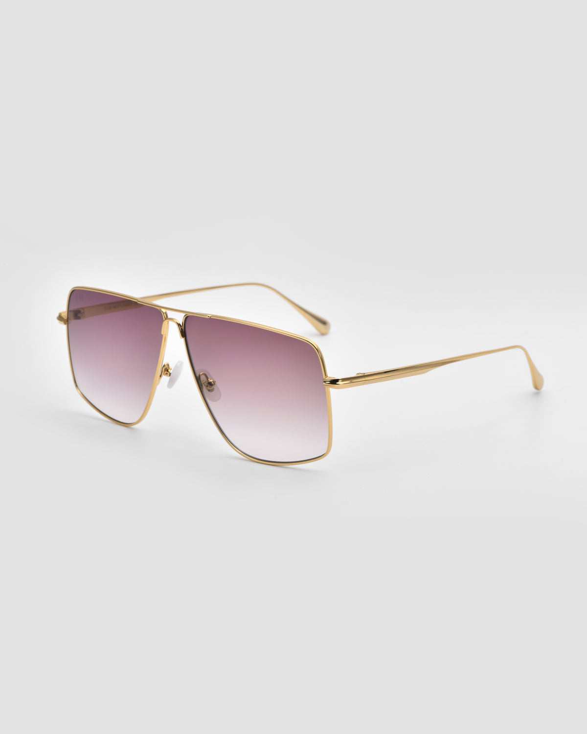 Marisol II by For Art’s Sake®: Gold-framed oversized aviators with gradient purple lenses and sculpted metal details, shown on a light gray background.
