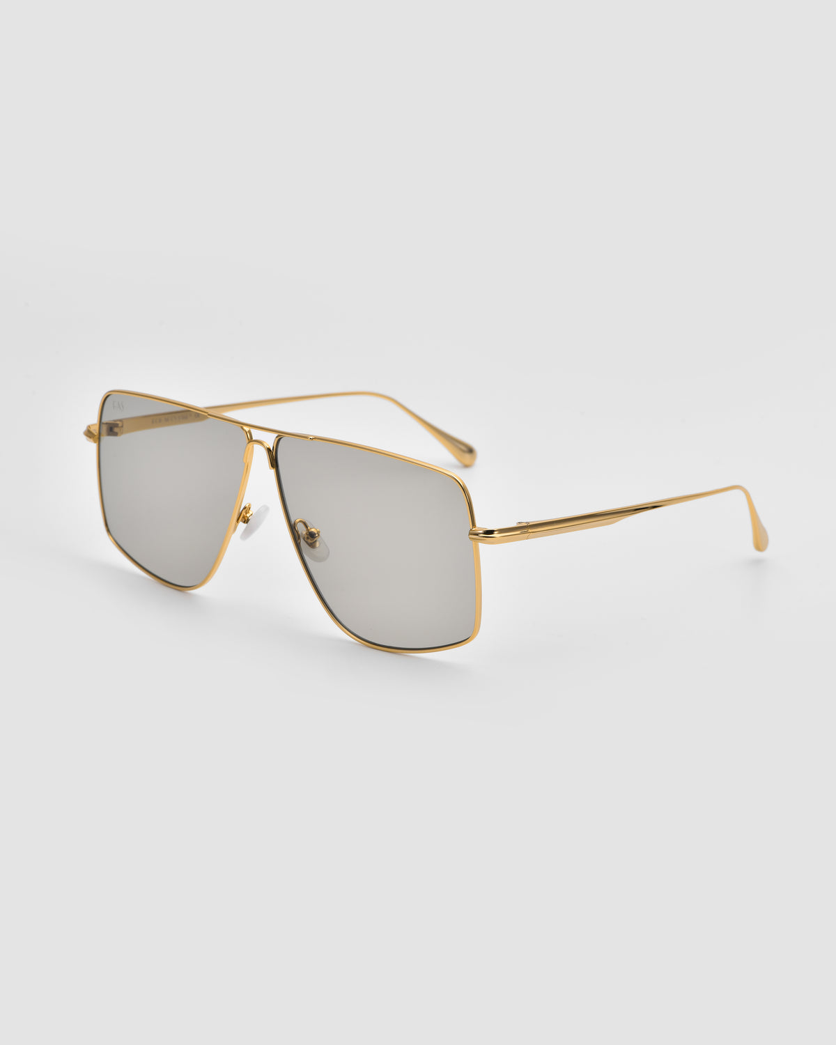 For Art’s Sake® Marisol II gold-framed square sunglasses with reflective lenses and sculpted metal details, displayed on a light gray background.
