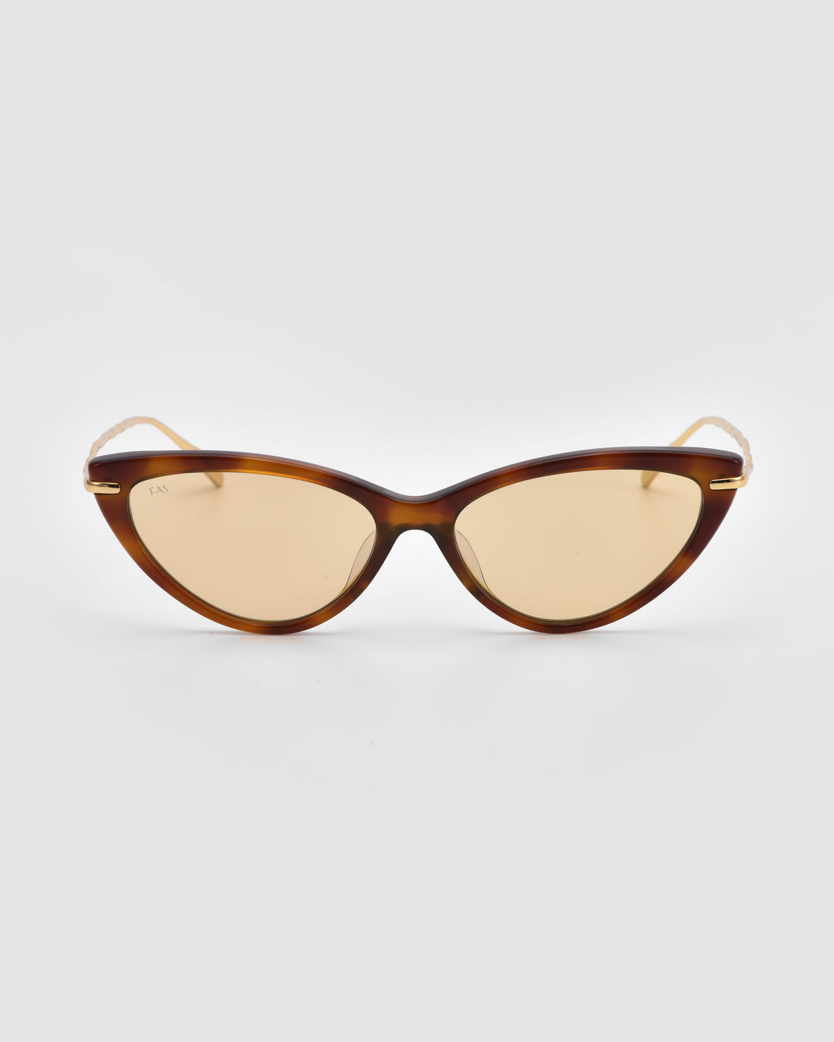 The Aurora sunglasses by For Art’s Sake® feature a brown cat-eye frame, light brown tinted lenses, sculpted metal temples, and an upward tilt for a retro-inspired look.