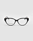 The Act by For Art's Sake®: black cat-eye eyeglasses with clear lenses and a lightweight frame, shown front-facing on a light gray background. The left lens displays small "FOR ART'S SAKE LONDON" text.