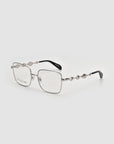 Fluid by For Art's Sake®: Silver metal eyeglasses with a soft-square shape and wavy 3D fluid temples with black tips, shown on a white background.