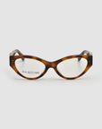 The Halo(X) cat-eye eyeglasses by For Art's Sake® feature a sculptural tortoiseshell acetate frame and clear lenses, with "FOR ART'S SAKE LONDON" printed inside. Shown on a white background, they're ideal for chic everyday style.
