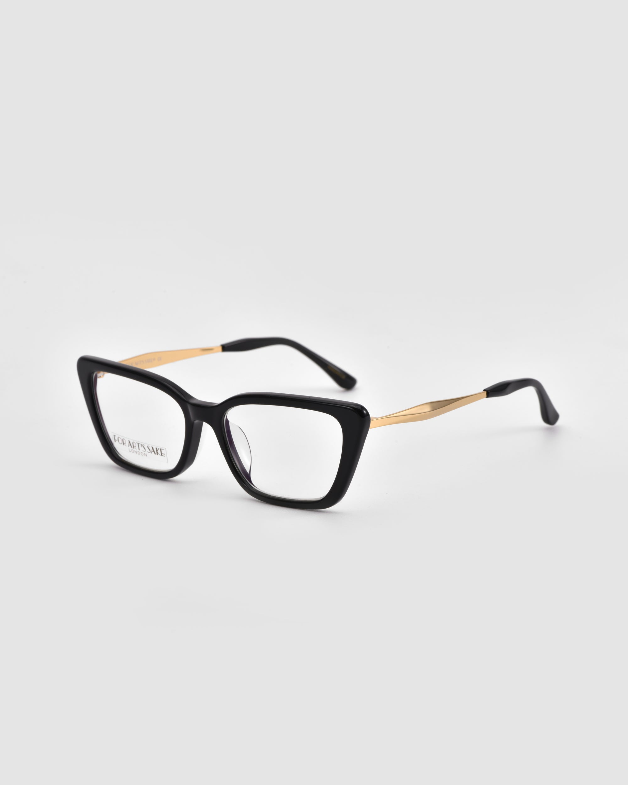 The Harmony(X) eyeglasses by For Art's Sake® feature a black rectangular frame with sculptural temples and black tips, shown on a light gray background.