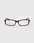 A pair of For Art's Sake® Motion II dark red boxy rectangular eyeglasses with clear lenses, curved acetate temples, and gold metal hinge accents is displayed on a plain light gray background. The left lens reads "For Art’s Sake London.