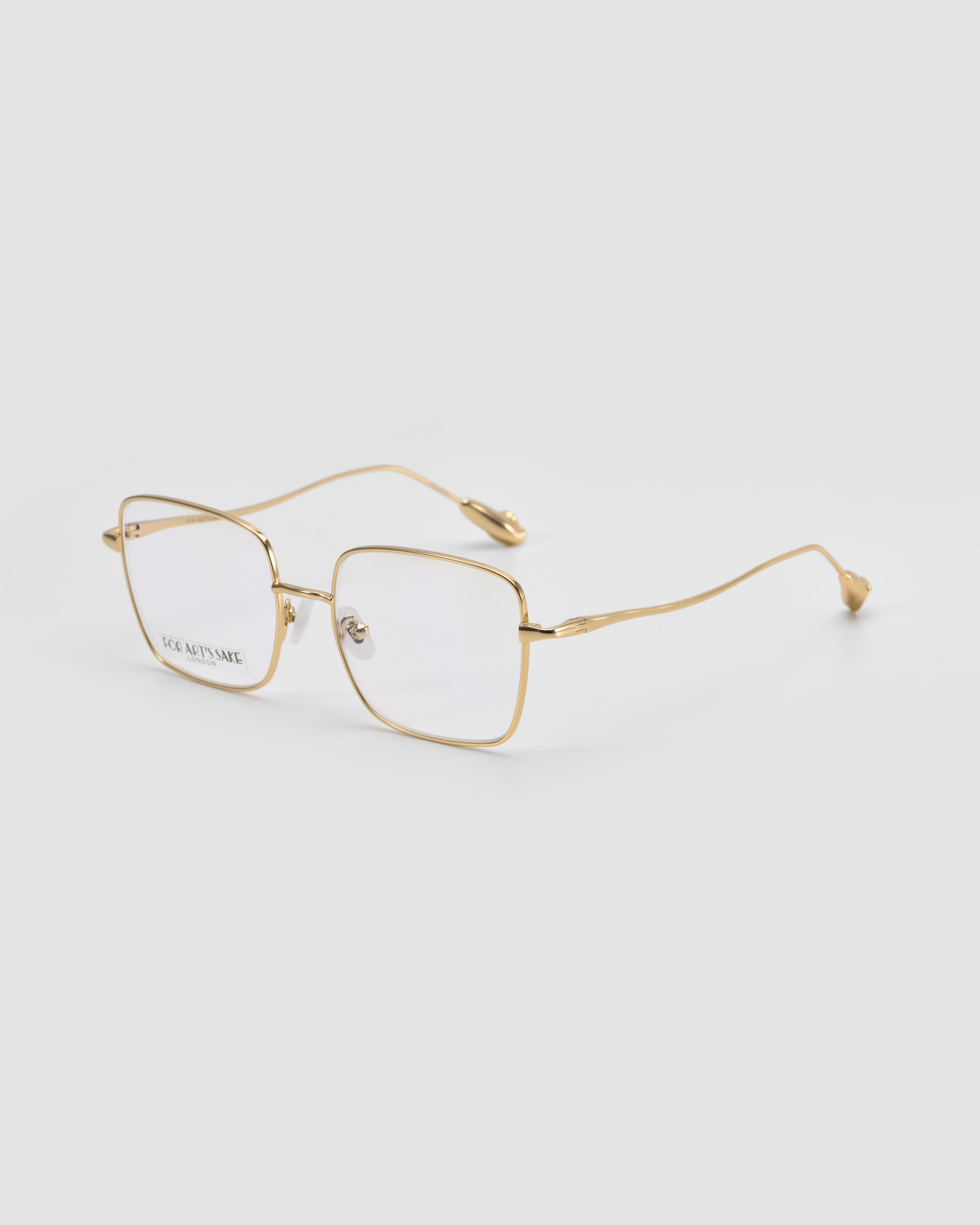 For Art's Sake® "Garden" eyeglasses feature gold-rimmed, squared metal frames with clear lenses and slightly curved temples for a lightweight, comfortable fit—shown angled on a white background.
