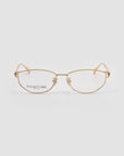 The Anita by For Art's Sake® is a pair of gold geometric metal eyewear with clear lenses, shown on a white background. "FOR ART'S SAKE LONDON" appears on the left lens. Lightweight and comfortable for everyday use.