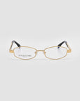 For Art's Sake® Iris gold rectangular sculptural eyeglass frames with clear lenses and black temple tips, displayed on a light gray background. The left lens is inscribed with "FOR ART'S SAKE LONDON," embodying quiet luxury.