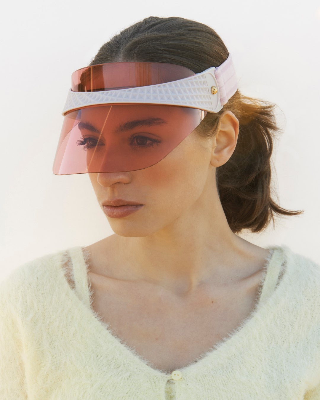 Cloud Visor, Pink on a model. 