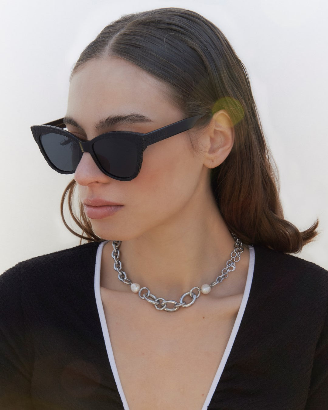 Crocodile Sunglasses, Black. Image on Model. 